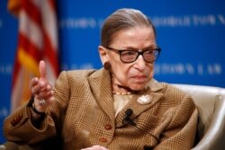 FILE - U.S. Supreme Court Associate Justice Ruth Bader Ginsburg speaks during a discussion on the 100th anniversary of the ratification of the 19th Amendment at Georgetown University Law Center in Washington, Feb. 10, 2020