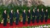 中共17大后九常委亮相，左一为当时的公安部长周永康