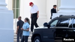 Predsednik Tramp izlazi iz Bele kuće i kreće za svoj golf klub u Sterlingu u Virdžiniji, 14. jula 2019.