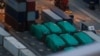 Beijing Warns Against Taiwan Ties as Singapore Tries to Free Troop Carriers in Hong Kong