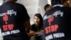 Journalists participate in a protest along the streets of Rangon after two weekly journals were banned indefinitely for publishing several stories without the consent of the local censorship board, Aug. 4, 2012.