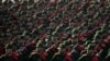 Cadets of Iran's Islamic Revolutionary Guard Corps march in a parade outside Tehran, Sept. 21, 2024. The U.S. on Sept. 27, 2024, filed charges against three members of the Guard, accusing them of hacking to interfere with U.S. elections.
