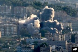 Smoke rises from Israeli airstrikes on Choueifat town, southern Beirut, Lebanon, Oct. 19, 2024.