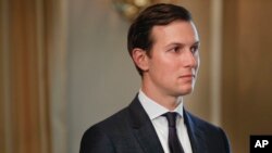 FILE - In this Friday, Aug. 11, 2017 file photo, White House senior adviser Jared Kushner listens as President Donald Trump answer questions. Kushner and other top Trump aides have been visiting the region to meet with Palestinians, Israelis and officials from neighboring Arab nations as it prepares to put forward a peace plan.