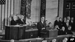 File - President Lyndon B. Johnson delivers State of the Union address to joint session of Congress, Washington, Jan. 8, 1964.