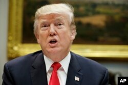 President Donald Trump speaks before hosting a lunch with Senate Republicans in the Roosevelt Room of the White House, Dec. 5, 2017, in Washington.