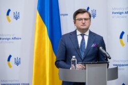 FILE - This handout photo taken and released by the Ukrainian Foreign Ministry's Press Office Jan. 17, 2022 shows Ukrainian Foreign Minister Dmytro Kuleba at a news conference in Kyiv.