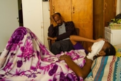 Beriha, 15, was shot on her face by an unknown sniper. She lost her left eye and is blind in the right eye, in Mekelle, Ethiopia, June 4, 2021. (Yan Boechat/VOA)