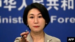 FILE - Juru bicara Kementerian Luar Negeri China, Mao Ning dalam konferensi pers di Kementerian Luar Negeri Republik Rakyat China di Beijing, 26 Juli 2023. (Pedro PARDO / AFP)