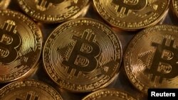 FILE PHOTO: Illustration shows representations of cryptocurrency Bitcoin