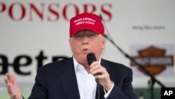 FILE - Republican presidential candidate Donald Trump speaks to supporters and bikers at a Rolling Thunder rally at the National Mall in Washington, D.C., May 29, 2016.