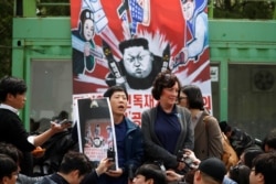 Park Sang-hak, a North Korean defector and leader of an anti-North Korea civic group, speaks as he prepares to release balloons containing leaflets denouncing North Korean leader Kim Jong Un, near the demilitarized zone in Paju, June 16, 2020.
