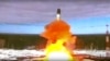 FILE - In this handout photo released by the Roscosmos Space Agency Press Service on April 20, 2022, the Sarmat intercontinental ballistic missile is launched from Plesetsk in northwestern Russia. 