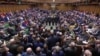 Tellers announce the results of the vote on Brexit in Parliament in London, Britain, March 13, 2019, in this image taken from video. 