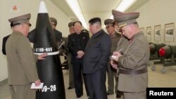 FILE - North Korean leader Kim Jong Un inspects nuclear warheads at an undisclosed location in this image taken from video. (KRT via Reuters)