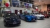 FILE - Toyota sedans are displayed in a showroom at Puente Hills Toyota in Industry, Calif., Feb. 14, 2019.