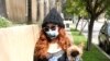 Phoebe Price wears a face mask and gloves amid fears of the coronavirus in Los Angeles, Calif., March 31, 2020. 