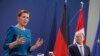 Kanselir Jerman Olaf Scholz (kanan) dan Perdana Menteri Denmark Mette Frederiksen dalam konferensi pers di Berlin, Jerman, 9 Februari 2022 .(Michele Tantussi / POOL / AFP)