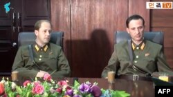 FILE - This screen grab taken Aug. 21, 2017, from an undated YouTube video released by Uriminzokkiri shows Ted Dresnok, right, son of US defector to North Korea James Joseph Dresnok, and his brother, James, during an interview at an unknown location. Uriminzokkiri, the state-run North Korea propaganda channel, has now been pulled from the YouTube website.
