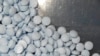 Foto yang dirilis oleh kantor Kejaksaan Agung Utah, AS, menunjukkan kumpulan tablet fentanyl palsu yang dijadikan bukti dalam sebuah kasus persidangan di wilayah tersebut pada 2019. (Foto: U.S. Attorneys Office for Utah via AP)
