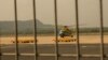 A helicopter takes off Tuesday from Vietnam's southwest Phu Quoc Island to search for the passengers of Malaysian Airlines flight MH370