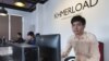 In Vichet, CEO of Khmerload.com website and a Cambodia's leading online shopping business Little Fashion, sits at his office in Phnom Penh, Cambodia on March 24, 2017. (Neou Vannarin/VOA Khmer)