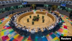 EU leaders take part in a European Union summit in Brussels, June 28, 2018.
