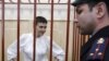 Надежда Савченко (на фото слева)
