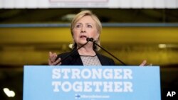 Democratic presidential candidate Hillary Clinton gives a speech on the economy after touring Futuramic Tool & Engineering, in Warren, Mich., Aug. 11, 2016. 