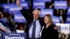 FILE - Sen. Bernie Sanders, I-Vt. (L) and his wife, Jane O'Meara Sanders, greet supporters as they leave after his 2020 presidential campaign stop at Navy Pier in Chicago, March 3, 2019.