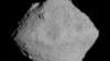 ARCHIVO - Los nuevos hallazgos encajan bien con la hipótesis de que cuerpos como cometas, asteroides y meteoritos que bombardearon la Tierra primitiva sembraron el planeta con compuestos que ayudaron a allanar el camino para los primeros microbios.
