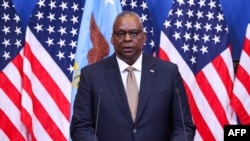 (FILES) US Defence Secretary Lloyd Austin speaks during a press conference at the NATO headquarters in Brussels, on October 11, 2023.