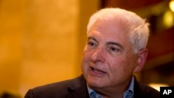 FILE - Panama's former President Ricardo Martinelli answers questions during an interview at a hotel in Guatemala City, Jan. 28, 2015. 