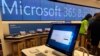 FILE - In this Jan. 28, 2020 file photo a Microsoft computer is among items displayed at a Microsoft store in suburban Boston.